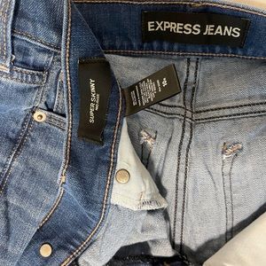Express super skinny mid rise jeans